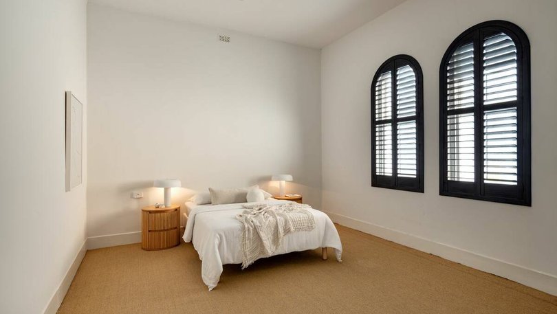 The property includes six bedrooms with an optional seventh.