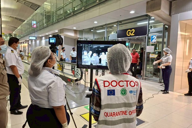 Quarantine doctors watch thermal scanning of travellers from west Bengal, India at the Suvarnabhumi International Airport in Samut Prakarn, Thailand.