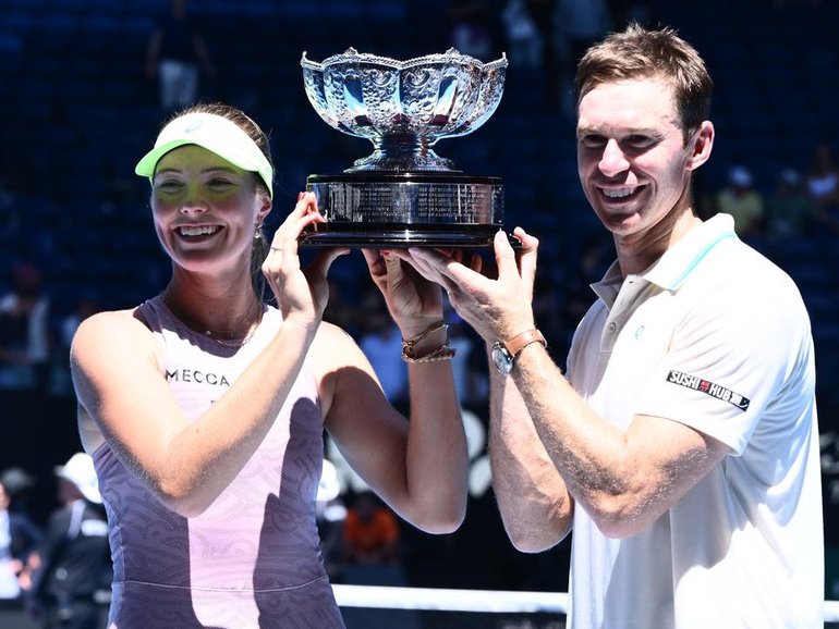 Triumphant again - Australians Olivia Gadecki and John Peers celebrate another mixed doubles title. (Joel Carrett/AAP PHOTOS)