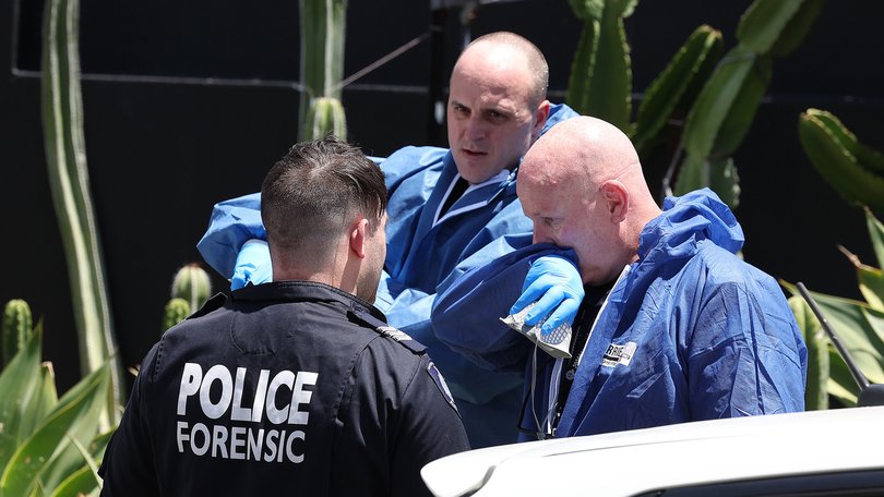 Police at an address in Mosman Park where two adults and two children were found dead.