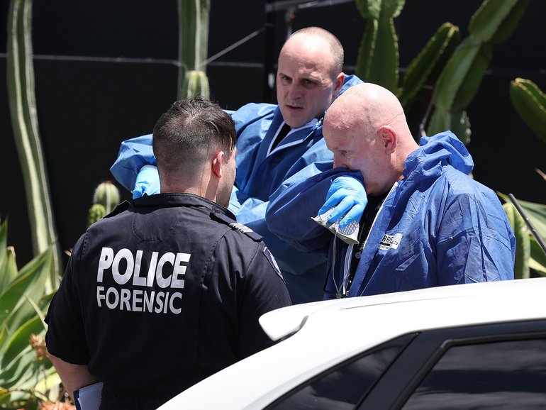 Police at an address in Mosman Park where two adults and two children were found dead.
