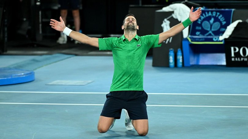 Novak Djokovic on his knees after his epic Australian Open semi-final triumph over Jannik Sinner.