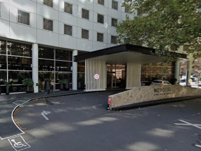 Two men are on the run after an alleged armed Sydney hotel heist.