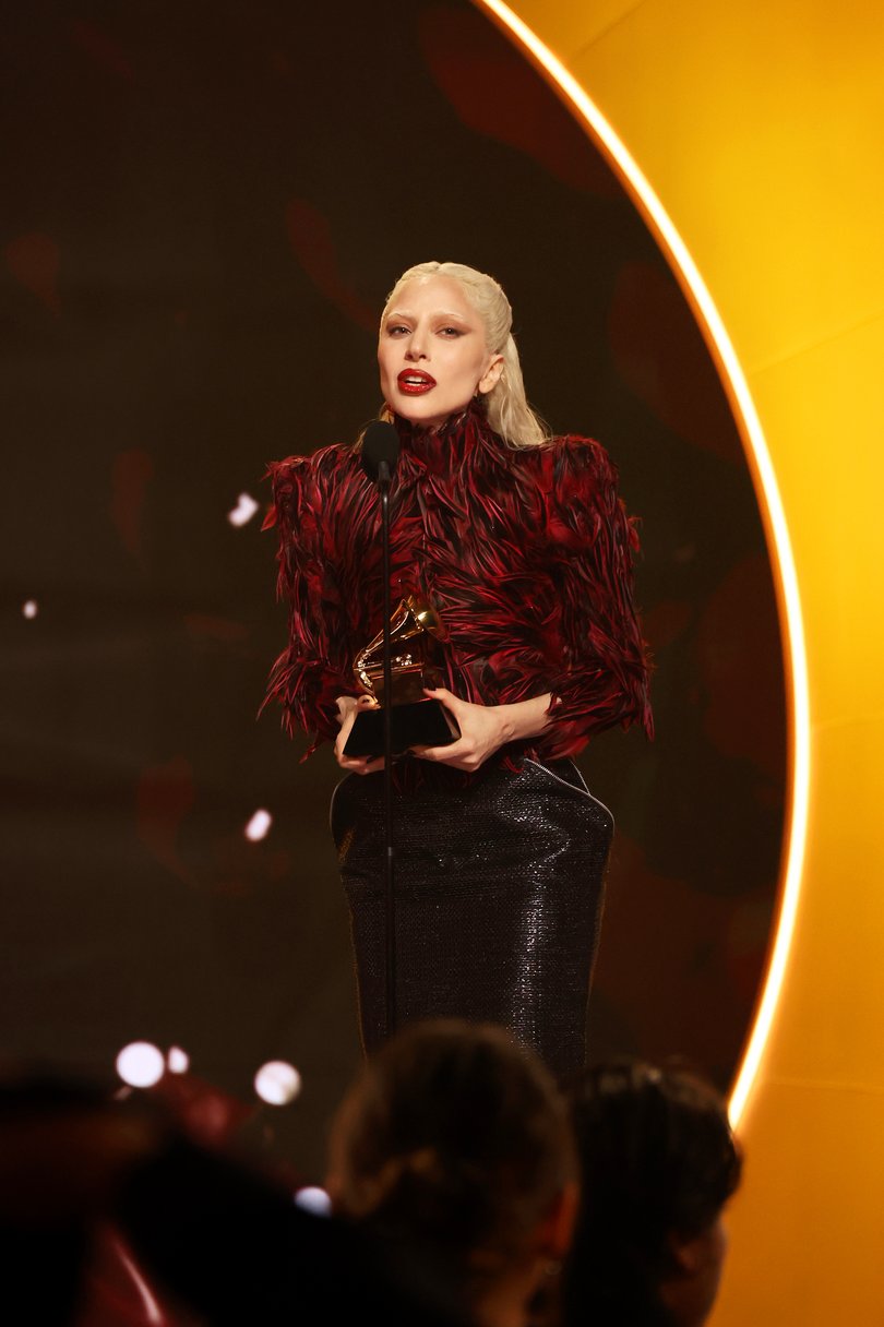 Lady Gaga accepts the Best Pop Vocal Album award for "MAYHEM" onstage.