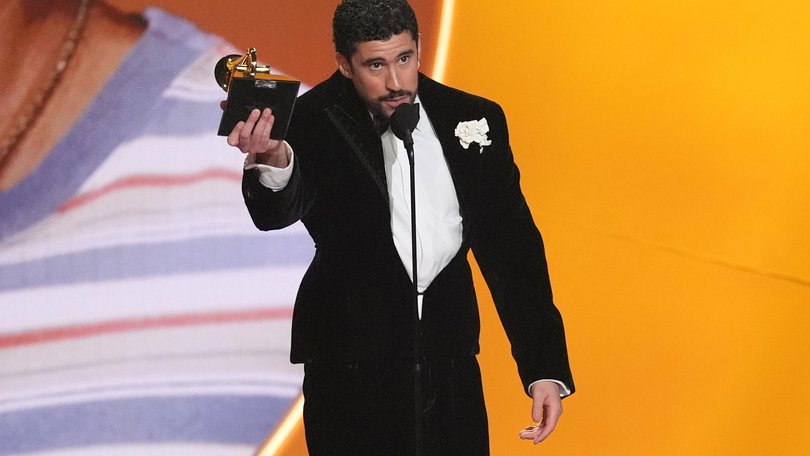 Bad Bunny accepts the award for album of the year for "Debí Tirar Más Fotos" during the 68th annual Grammy Awards on Sunday, Feb. 1, 2026, in Los Angeles. (AP Photo/Chris Pizzello) Chris Pizzello