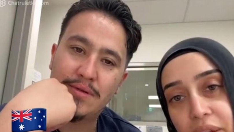 Ahmad Rashad Nadir and Sarah Abu Lebdeh, wearing their NSW Health uniforms. Picture: NewsWire Handout