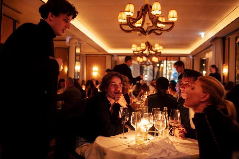 Diners at the restaurant on the ground floor of L’Aventure.