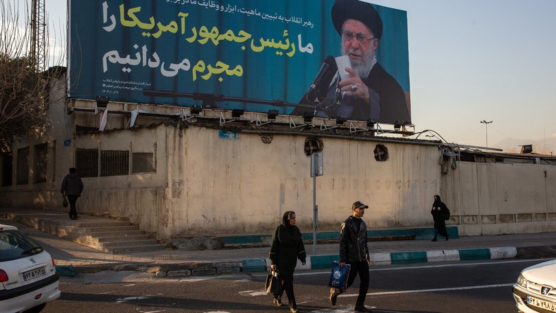 A billboard in Tehran, Iran, showing IranÕs supreme leader, Ayatollah Ali Khamenei, reads ÒWe recognize the American president as a criminal,Ó Jan. 27, 2026. Senior U.S. and Iranian officials are expected to meet in Istanbul on Friday for talks aimed at de-escalating the crisis between their countries, according to two current regional officials and a former one who were familiar with the planning. (Arash Khamooshi/The New York Times)