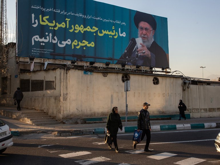 A billboard in Tehran, Iran, showing IranÕs supreme leader, Ayatollah Ali Khamenei, reads ÒWe recognize the American president as a criminal,Ó Jan. 27, 2026. Senior U.S. and Iranian officials are expected to meet in Istanbul on Friday for talks aimed at de-escalating the crisis between their countries, according to two current regional officials and a former one who were familiar with the planning. (Arash Khamooshi/The New York Times)