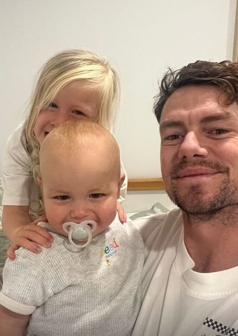 Lachie Neale with his kids who are living in Perth.