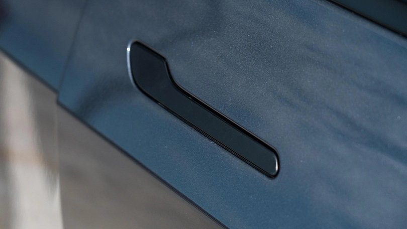 Tesla Model 3 retractable door handle. Such designs will soon be banned in China