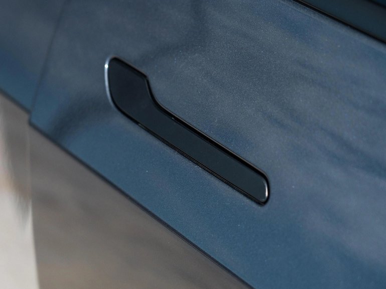 Tesla Model 3 retractable door handle. Such designs will soon be banned in China