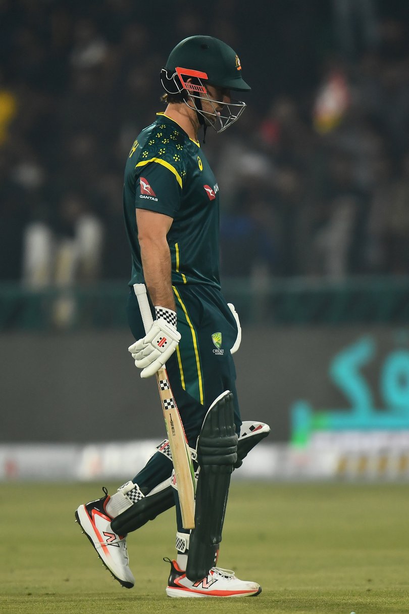 Mitchell Marsh of Australia walks off the field after being dismissed.