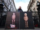 Political satire artist Kaya Mar with his paintings of British Prime Minister Keir Starmer and Andrew Mountbatten-Windsor outside Downing Street on February 4.