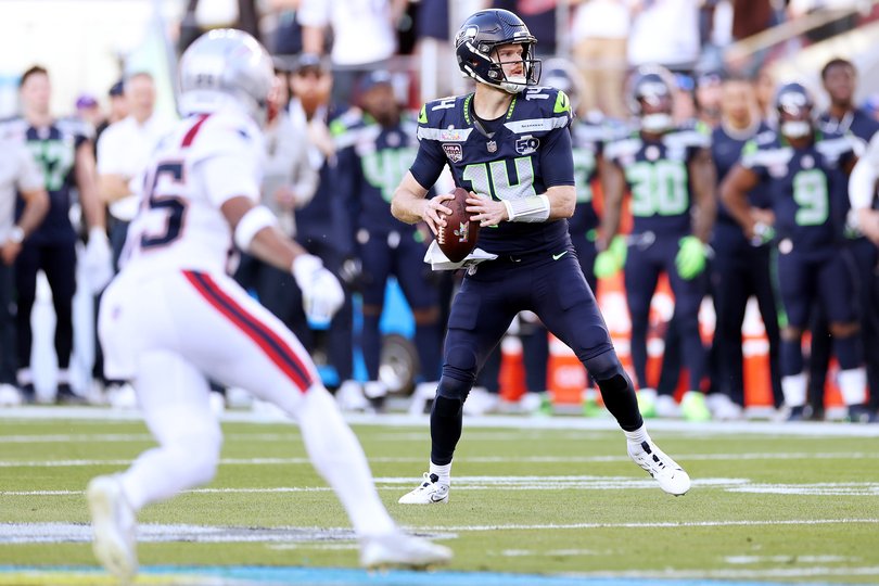 Sam Darnold looking to pass.