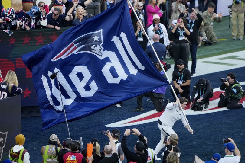 The Patriots take to the field.