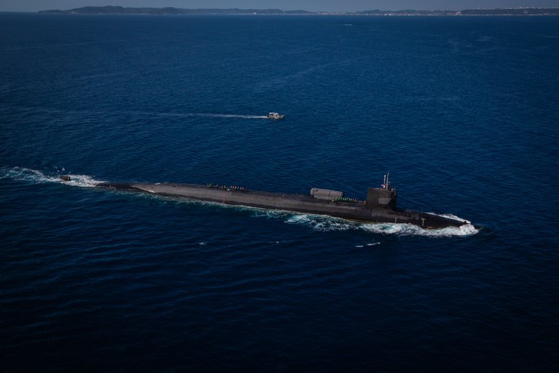 The Ohio-class submarine, seen here in an image provided by the U.S. Marine Corps, is longer than the Washington Monument is high. Beijing, Moscow and shaken American allies are seeking new warheads as President Trump ends more than a half century of nuclear arms control with Russia.