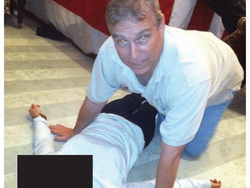 Andrew holding himself about a young woman in an image released from the Epstein files.