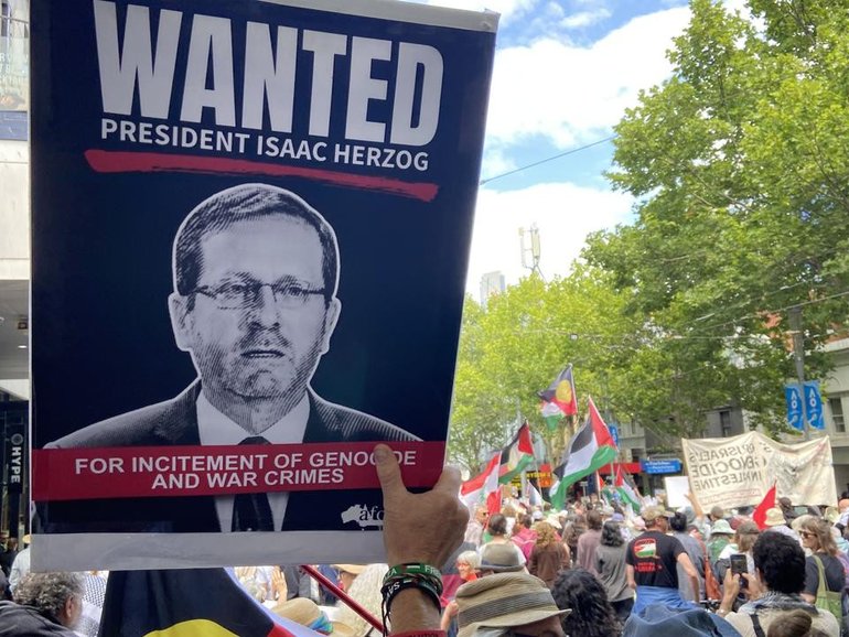 Protesters and human rights experts have called for Isaac Herzog's invitation to be rescinded. 