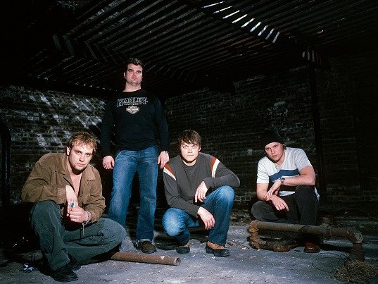 Tributes flood in after rock legend dies aged 47.