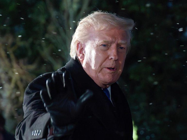 Donald Trump has lashed out at a US Olympic skier, labelling him "a real loser". (AP PHOTO)