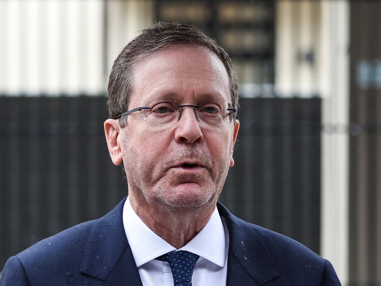Israeli President Isaac Herzog addresses the media during a ceremony in Bondi Beach.