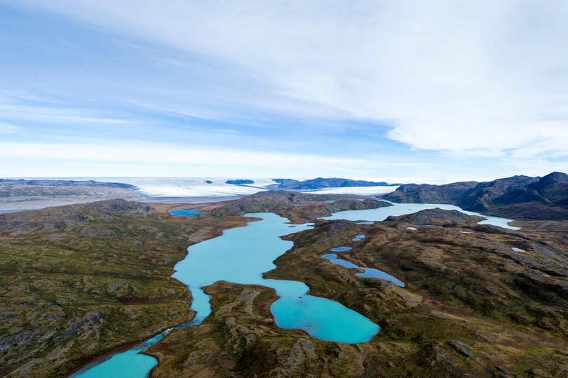 Turquoise glacial lakes on a highland tundra plateau. 