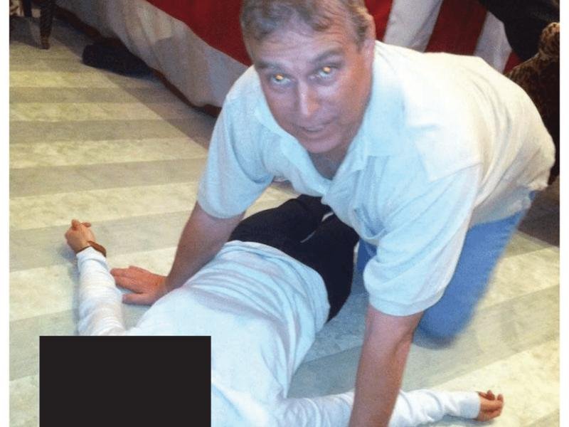 Pictures showing Andrew crouching over an unidentified woman have been released. (AP PHOTO)