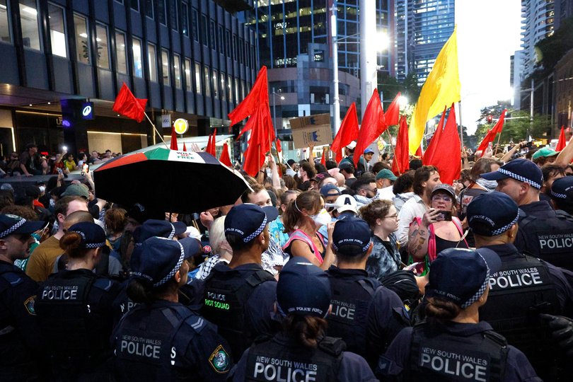 Members of NSW Police and pro-Palestine supporters clash outside Town Hall during Israel's President Herzog visit to Sydney on February 09, 2026.