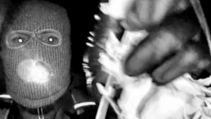 Images released by the FBI show a masked person at the home of Nancy Guthrie. (AP PHOTO)