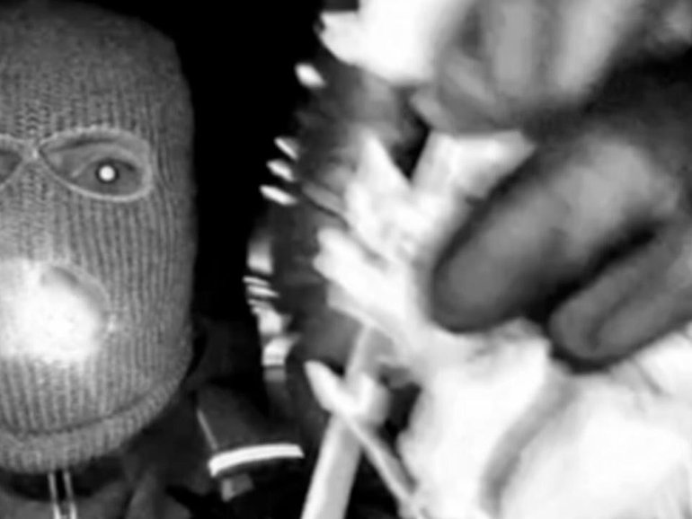 Images released by the FBI show a masked man at the home of Nancy Guthrie. (AP PHOTO)