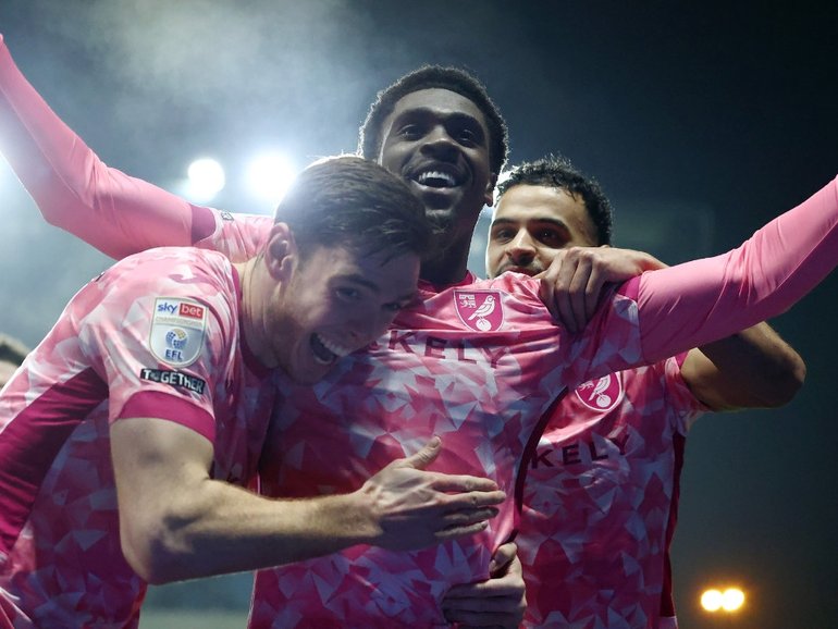 Mohamed Toure celebrates a goal on his first start for Norwich.