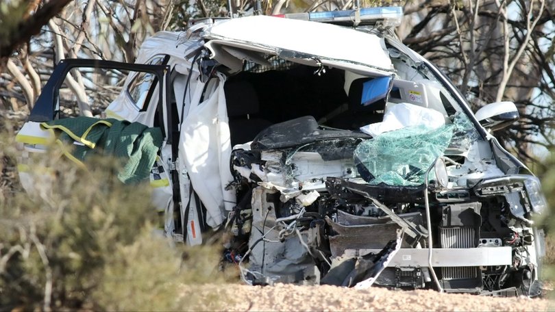 The front of the police car suffered severe damage in the crash.