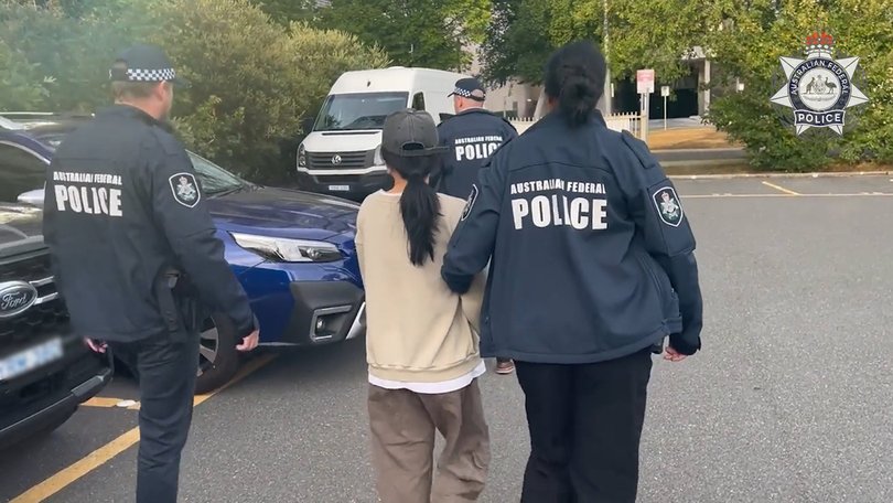 Two Chinese nationals have been charged with foreign interference offences in Canberra over alleged links to a spying plot.