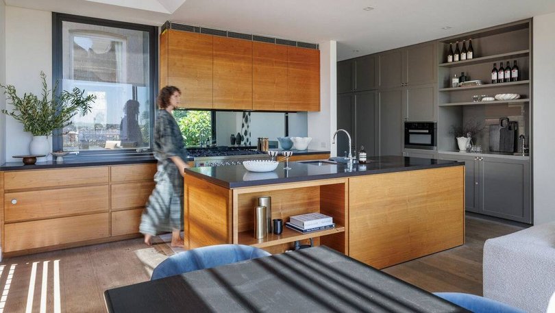 The modern kitchen includes a butler's pantry.