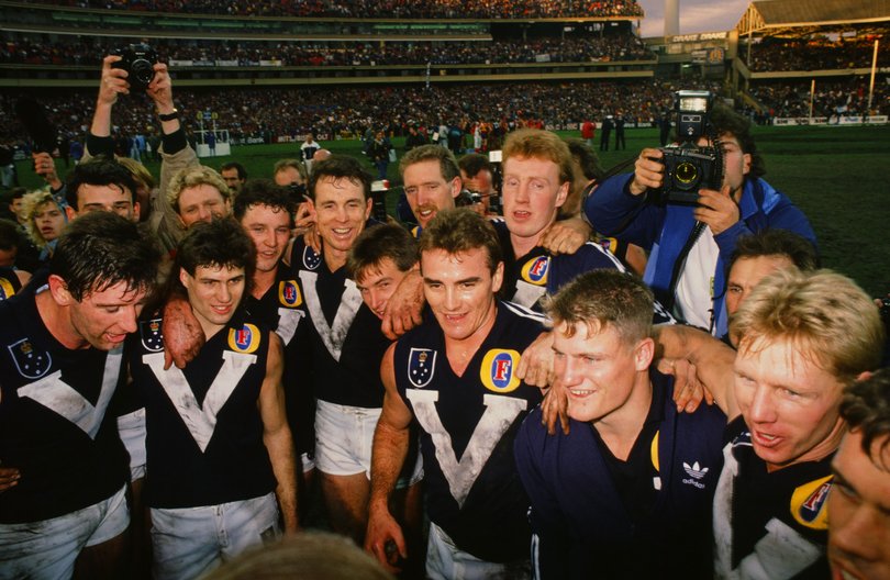 The Victorian team celebrates after winning the 1989 VFL State of Origin match between Victoria and South Australia at the Melbourne Cricket Ground.