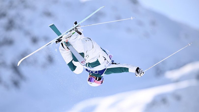 Australia's Cooper Woods has won Olympic gold in the men's moguls at Livigno. 