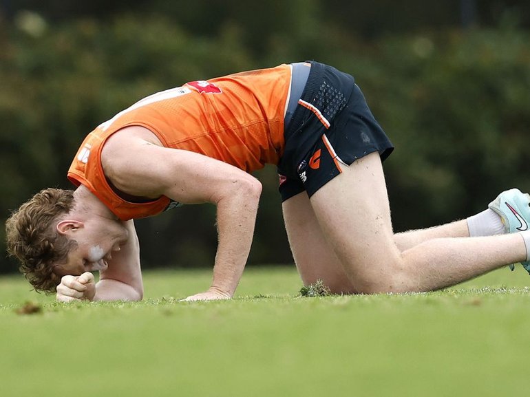 Giants star Tom Green has gone down at training with a suspected ACL injury.