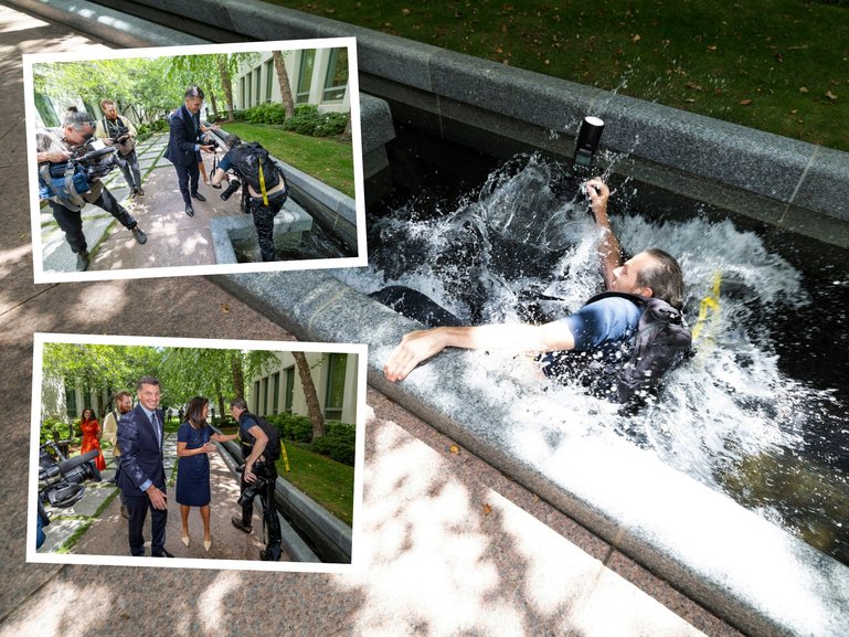 The eager photographer Martin Ollman made a splash infront of Angus Taylor.