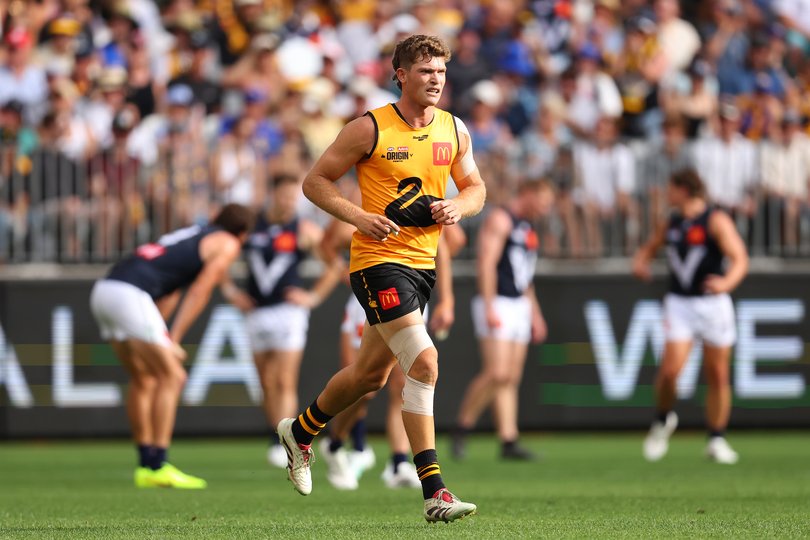 PERTH, AUSTRALIA - FEBRUARY 14: Mitch Georgiades of Western Australia jogs from the field after landing on Jacob Weitering of Victoria during the 2026 AFL Origin match between Western Australia and Victoria at Optus Stadium on February 14, 2026 in Perth, Australia. (Photo by Paul Kane/Getty Images)