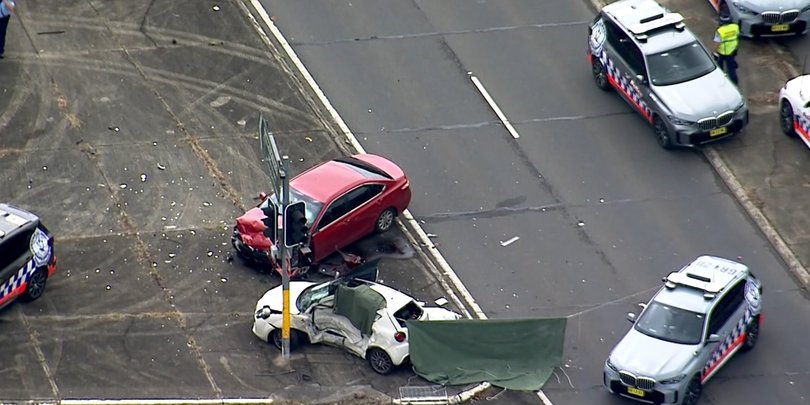 Two people are dead and a man has been charged after a horror crash following a pursuit in Sydney’s southwest.
