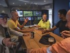 A group of friends in a designated smokers’ room at a pub in Sydney.