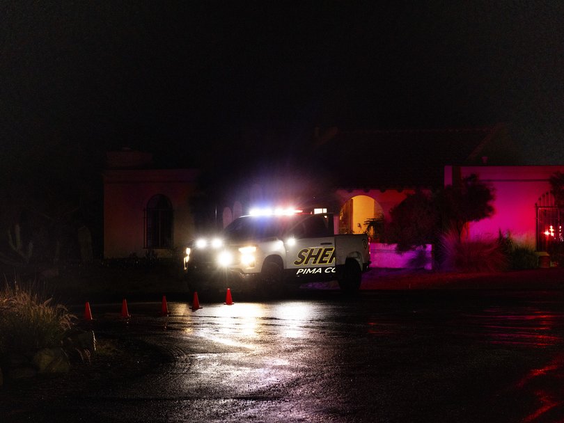 Police blockade at a street about two miles from Nancy Guthrie’s home in Tucson, Ariz.