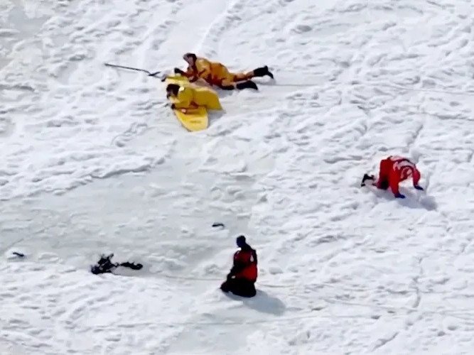 Members of the Eastham Police and Fire Departments search Bee’s River at First Encounter Beach in Massachusetts.