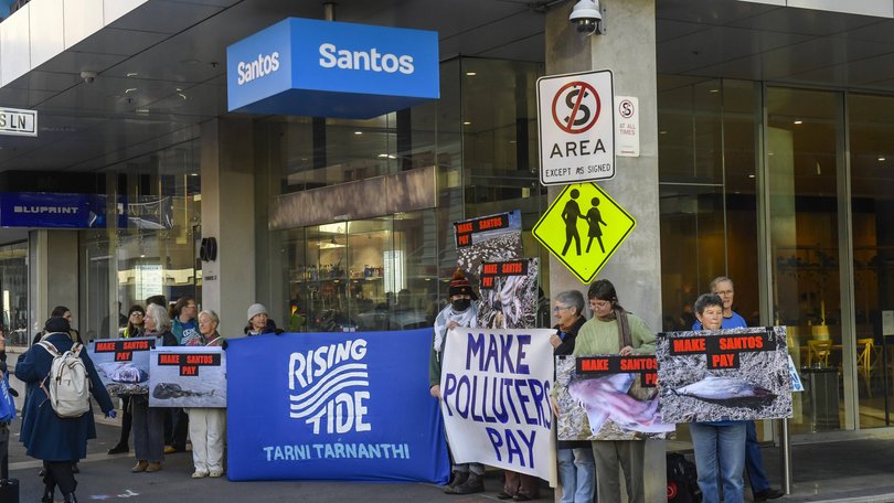 ADELAIDE, AUSTRALIA- NewsWire Photos- JULY 30, 2025. CLIMATE CHANGE. Protesters outside Santos building Adelaide. Environmentalists take action in response to the catastrophic fish kill that has been going on for months in SA waters RoyVPhotography