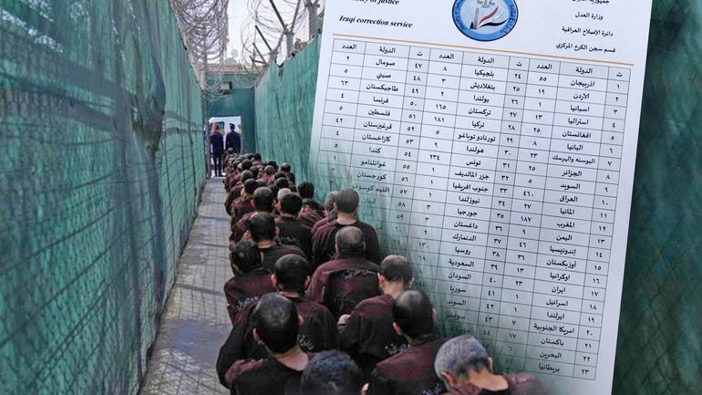 The list of ISIS foreign fighters and Iraqi security forces lead suspected militants for questioning at Karkh Central Prison.