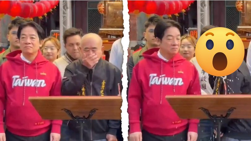 The foul footage shows the unaware leader cop a mouthful during official Lunar New Year celebrations.