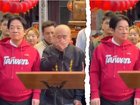 The foul footage shows the unaware leader cop a mouthful during official Lunar New Year celebrations.