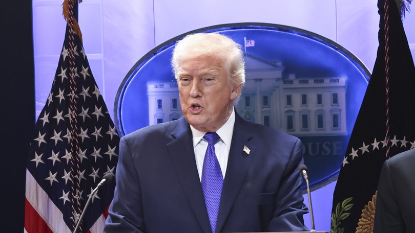 President Donald Trump speaks to reporters about a ruling by the Supreme Court at the White House in Washington, on Friday, Feb. 20, 2026.