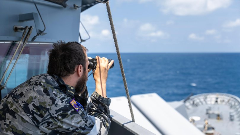 Leading Seaman Boatswains Mate Jack Dimmack looks out at the horizon as bridge watch on HMAS Toowoomba while in the South China Sea. LSIS Zac Dingle
